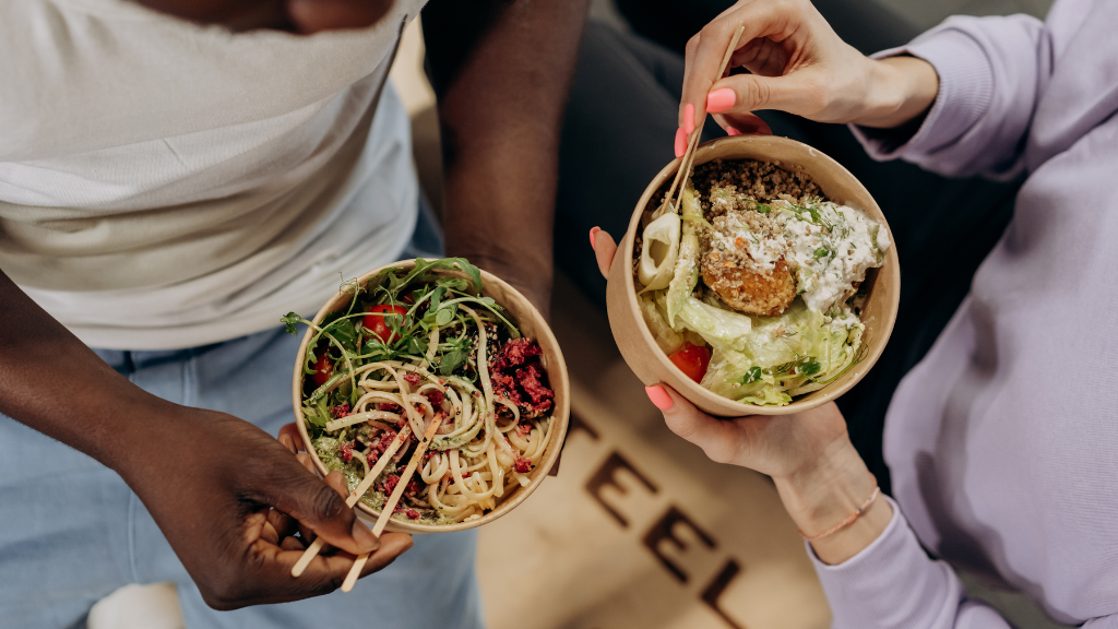 Man And Woman Eating Healthy Food