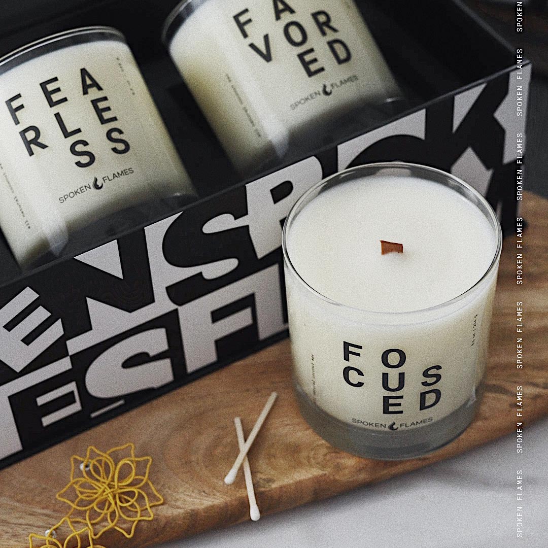 Spoken Flames candle gift set with green ribbon