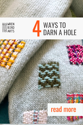 Sweater with multiple darned patches reading 4 ways to darn a hole