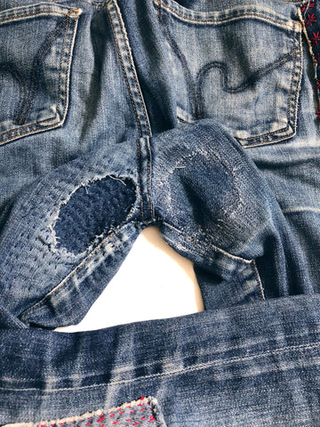 jeans worn out between thighs