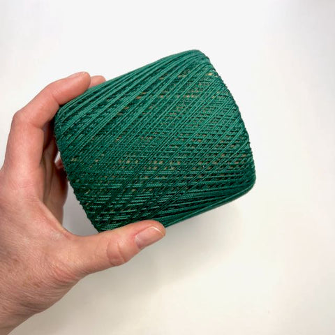 crochet cotton in hand