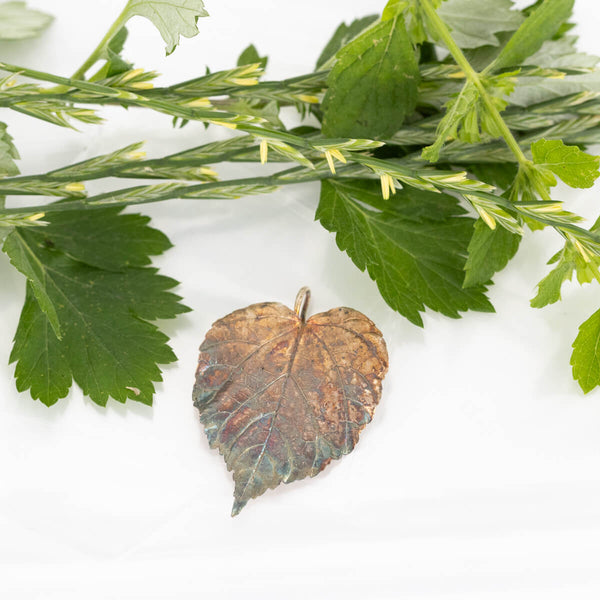 Spiritual jewelry, linden leaf pendant in silver