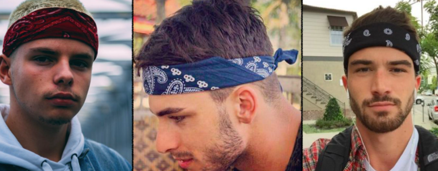 Un Jeune Homme Cool Portant Du Bandana Fixe Sa Manche Image stock