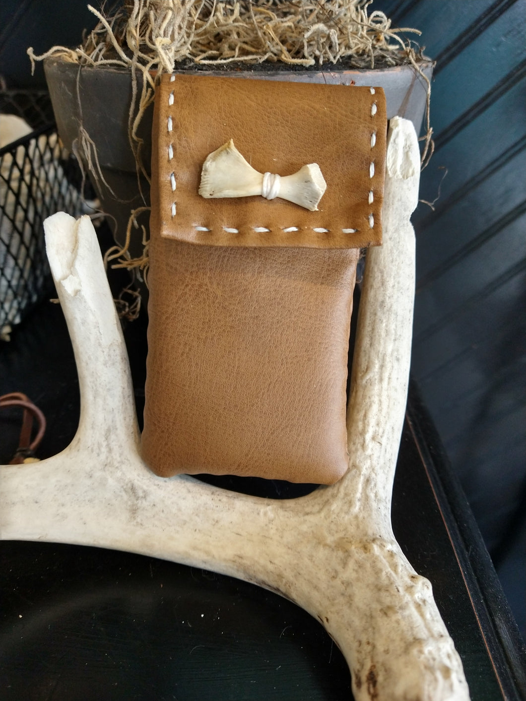 Herb pouch with bone