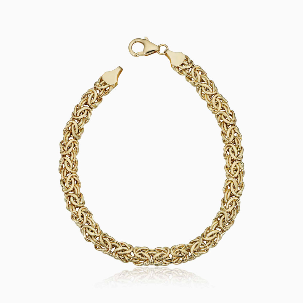 Embrace the timeless elegance of our 916 Gold Roman Links Bracelet