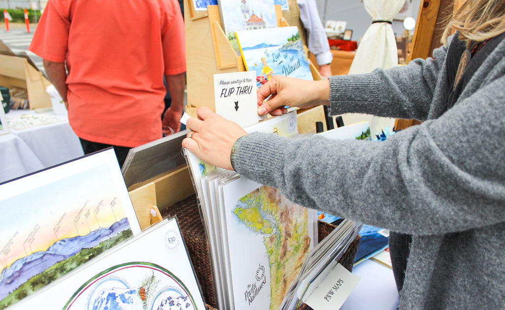 Setting up a craft fair booth display