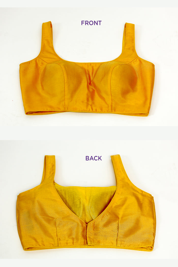 sleeveless yellow blouse