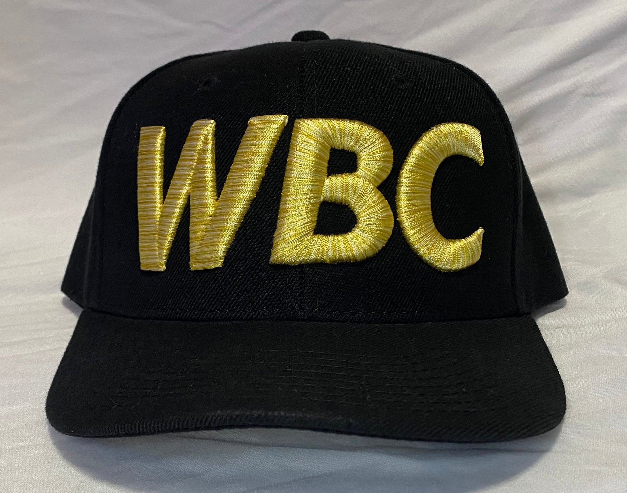 BLACK WBC YELLOW / WHITE LETTERING HAT