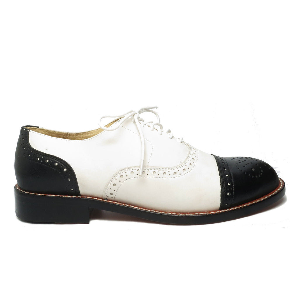 black cap toe shoe