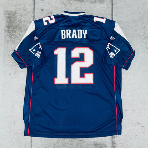 I know it's a long shot but does anyone know where I can find a 2009 AFL  50th Anniversary AWAY Jersey? Preferably Tom Brady. My all-time favorite  Pats jersey. Love the red