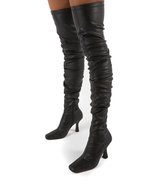 black over the knee heeled boots