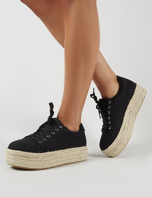 black flatform trainers