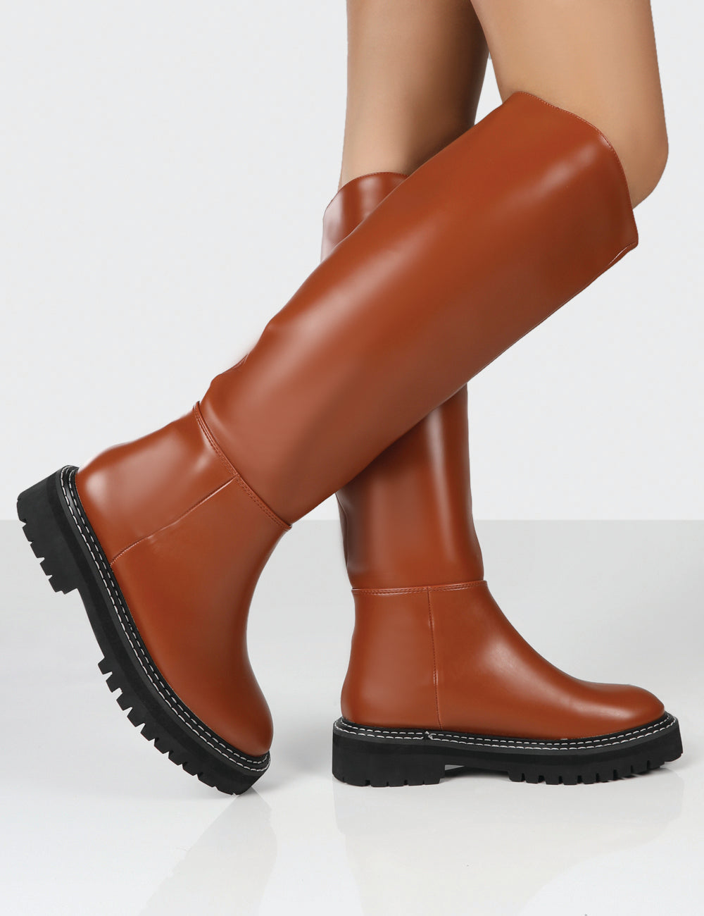 Dana Tan Pu Chunky Sole Knee High Boots