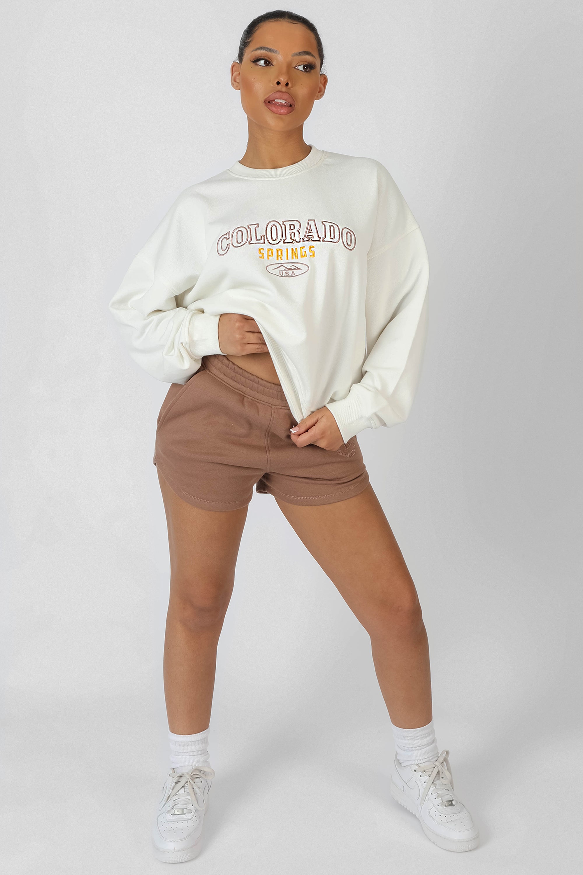 Embroidered Curved Hem Runner Short Tan