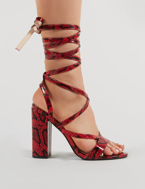 snakeskin lace up block heels