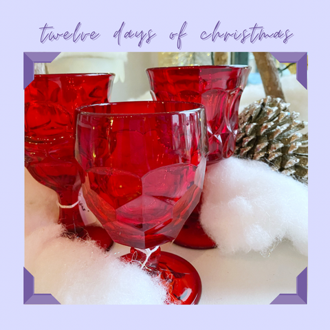 red vintage pressed glass goblets in festive setting