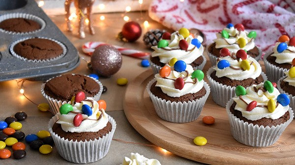 Super cute Christmas lights chocolate cupcakes with cream