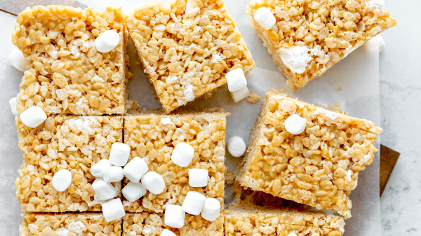 Delicious square that is made with rice cereal, melted marshmallows, peanut butter, and butter. 