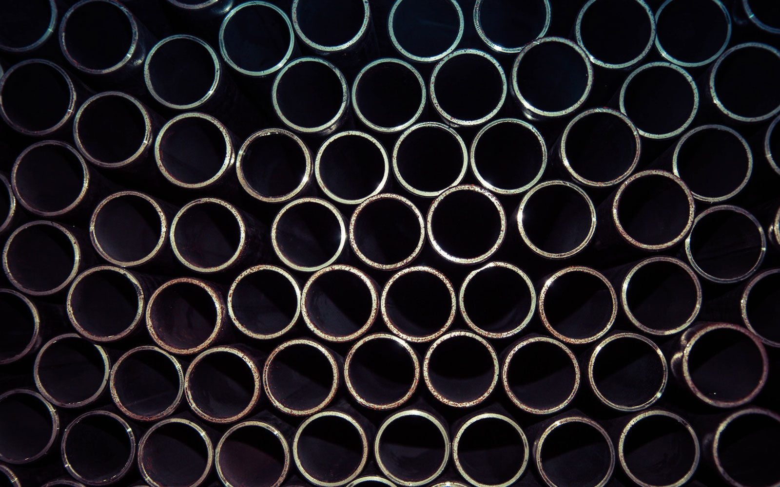 pile of steel tubing open ends
