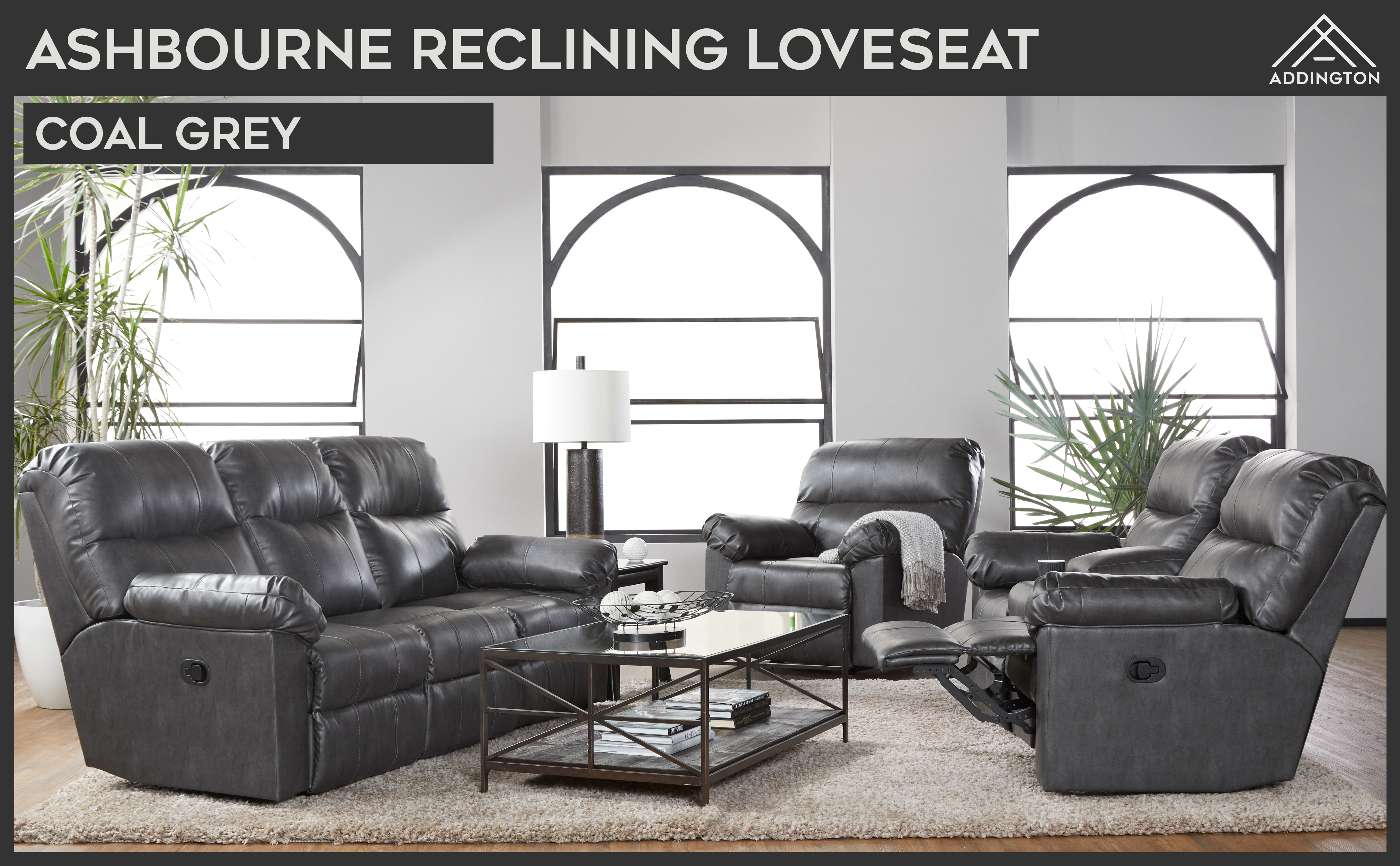 ashbourne reclinign loveseat grey lifestyle.png__PID:e83ce9bd-1b61-4d47-b02a-ff953b6c6dcf