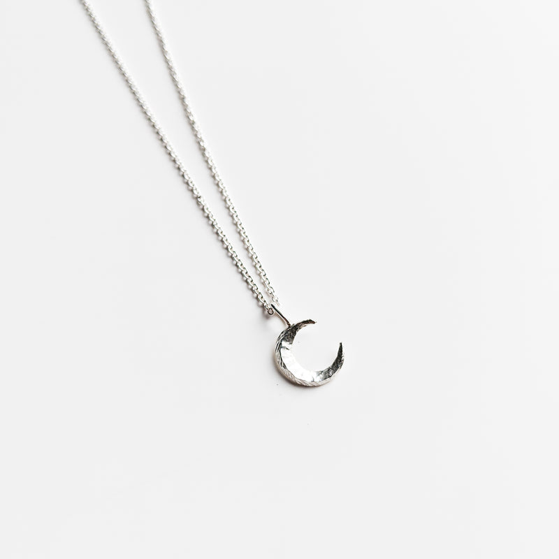 Textured sterling silver moon charm necklace