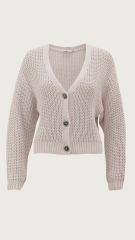 A sustainable beige knit cardigan from the brand Jan n June.