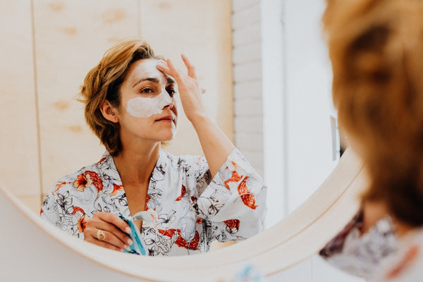 Menopause woman applying cream