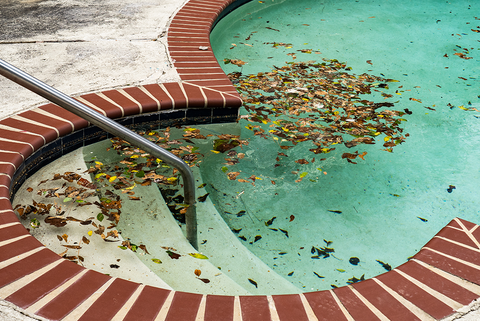 Autumn leaves swimming pool