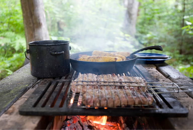 cooking food over a campfire