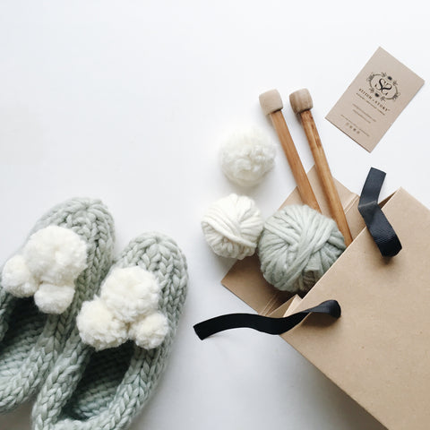 Shop the Lola Pom Slippers knitting kit