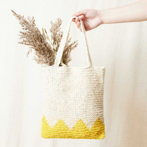 Shop the Crochet Zigzag bag PDF crochet pattern and yarn bundle at Stitch & Story