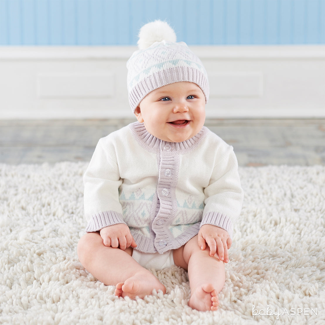 White Fair Isle Cardigan and Pom Pom Hat | 9 Ideas to Keep Baby Warm This Winter | Baby Aspen