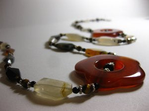 I created a one of a kind Nomi necklace using Carnelian and Agate stones.