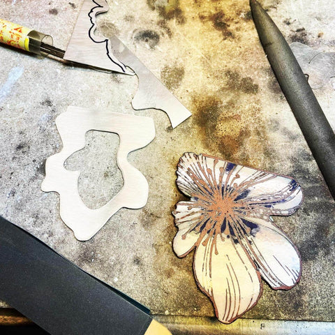 Amy Delson creating backing in sterling silver