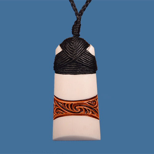 Maori Kowhaiwhai Design Stained Bone Toki | Discoveries