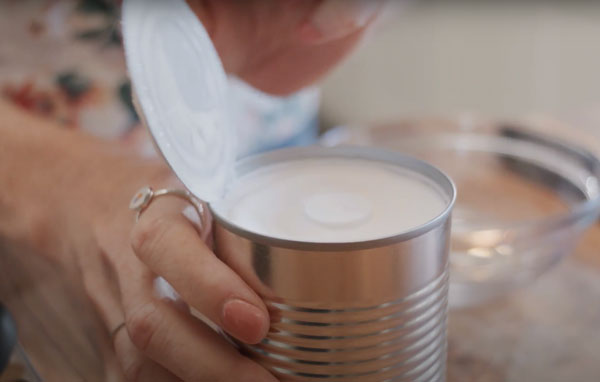 Opening a can of coconut cream