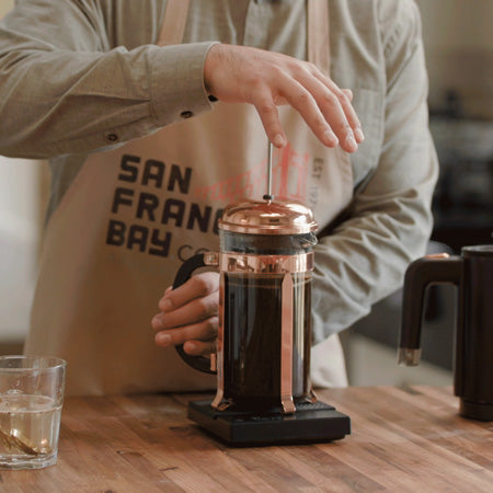 Preparing french press coffee.