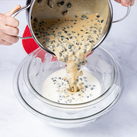 Pour hot coffee mixture into cream. 