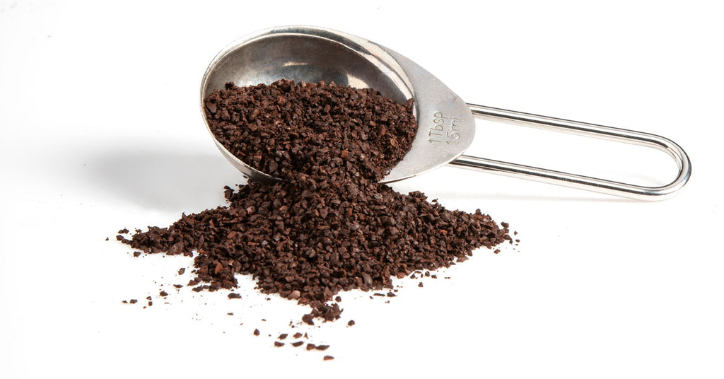 Scoop of coffee grounds.