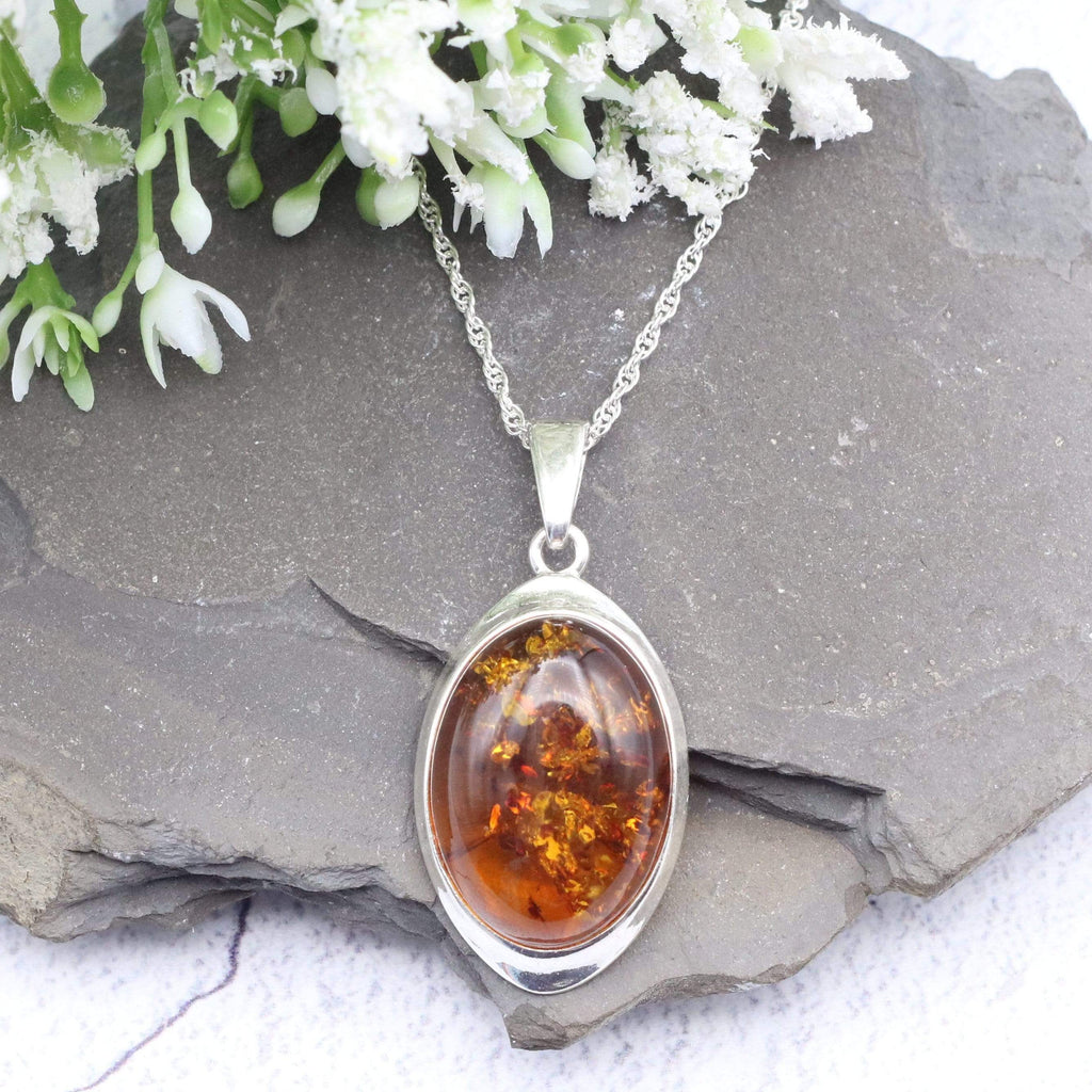 Fish Pendant in Silver with Amber – The Amber Room