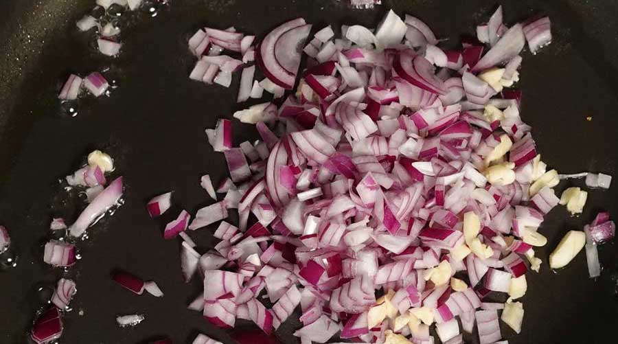 Saute onions in pan