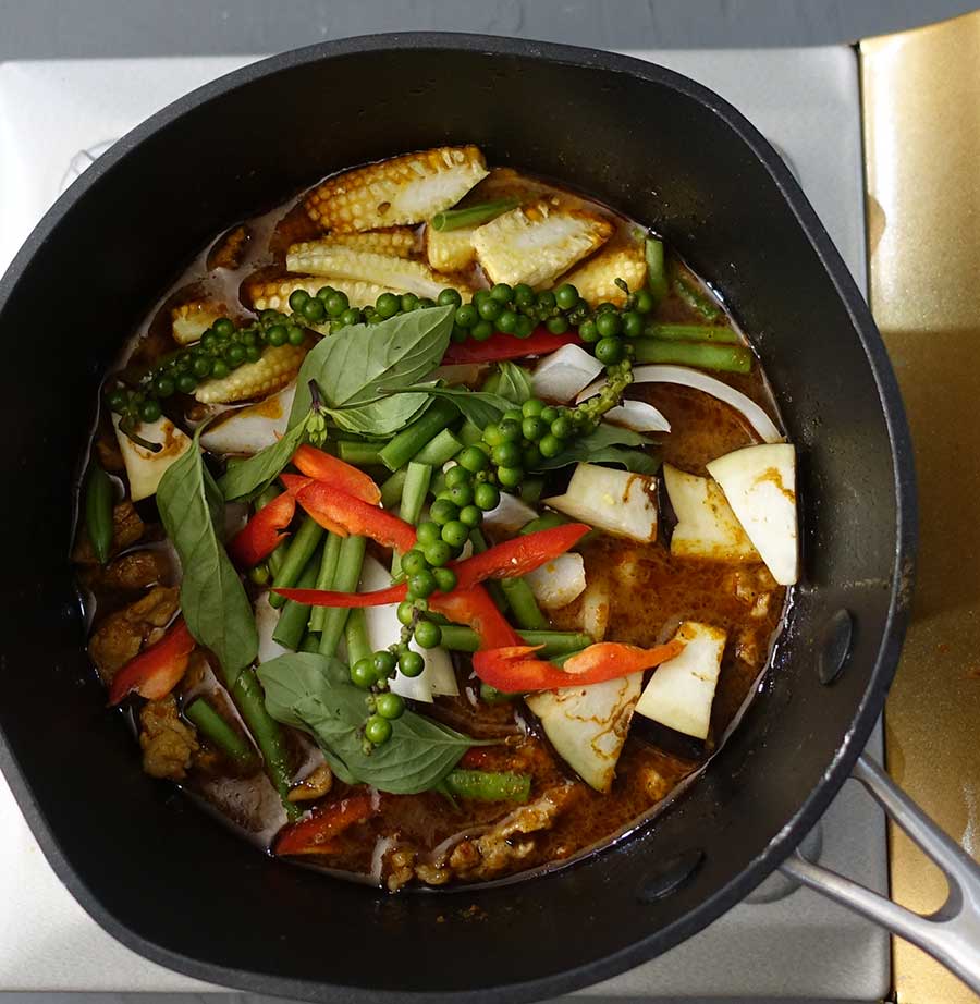 Add vegetables to pan simmer till cooked