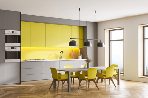 bright yellow kitchen with slab doors