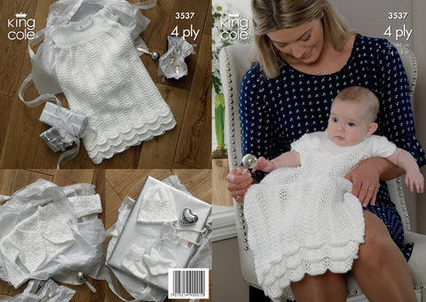 Image of knitting pattern cover showing a baby in a Christening dress with matching bolero, hat and bootees. Knitted in 4 ply yarn