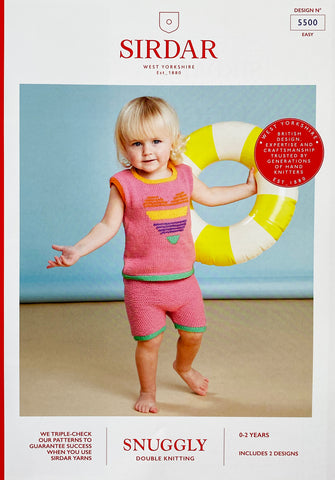 Image of cover of Sirdar knitting pattern showing a young baby wearing a knitted shorts and vest set. Knitted in pink DK yarn with contrast green, yellow and orange trim and a stripey love heart motif on the front