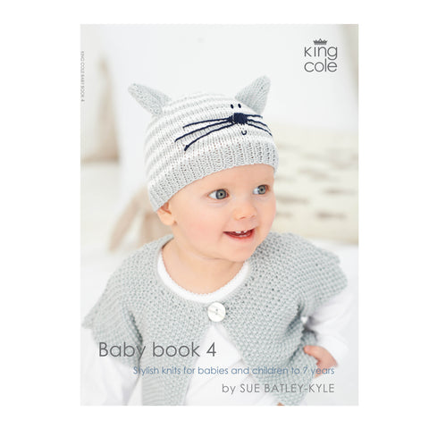 Image of cover of King Cole Baby Book 4 knitting pattern book featuring a baby with a cute cat themed hat complete with ears and whiskers