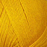 Swatch of Hayfield Bonus Aran with wool yarn in bright mustard