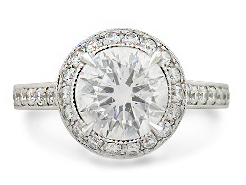 Round Brilliant Cut Diamond Halo Solitaire Engagement Ring in White Gold 