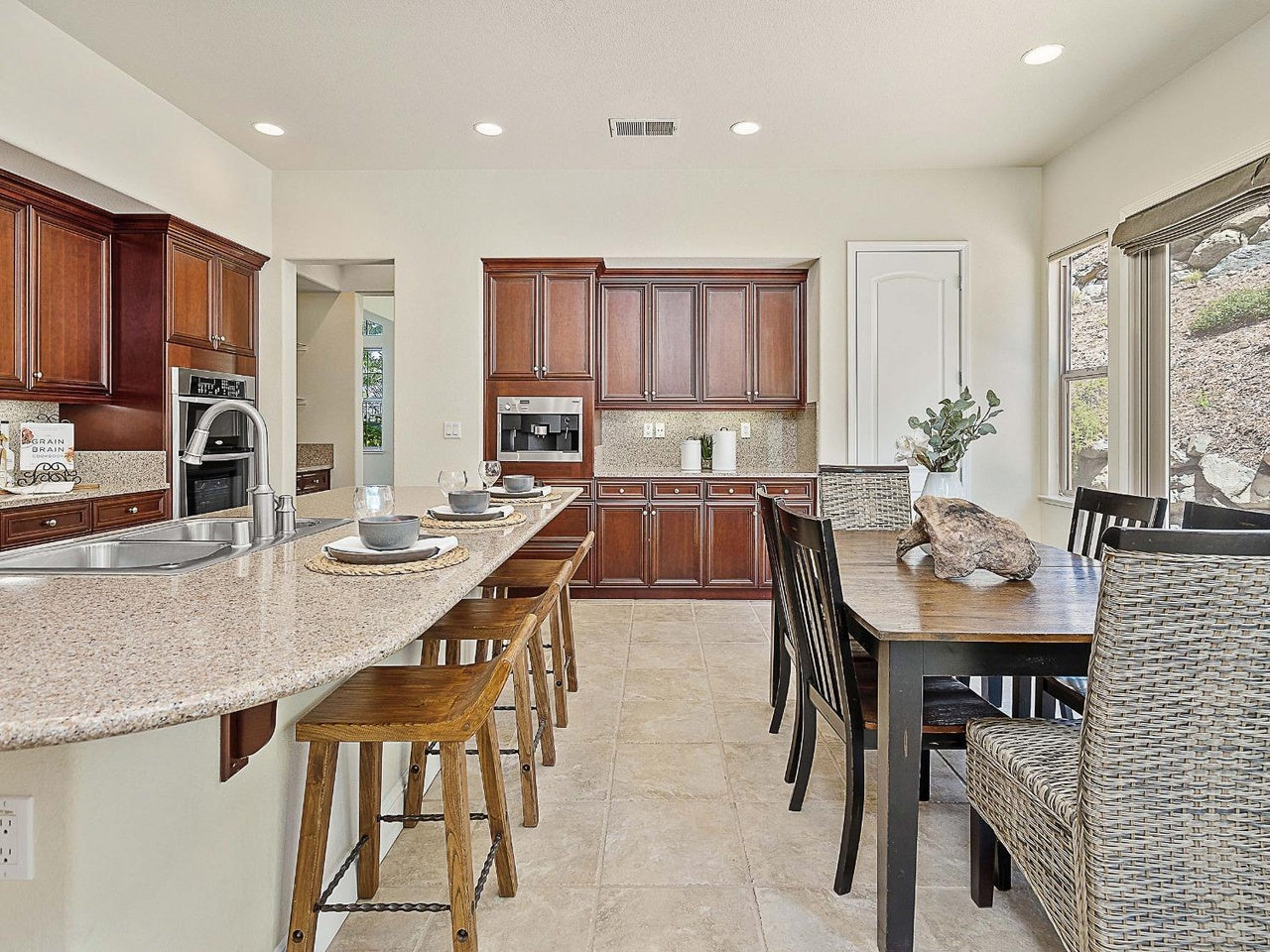 Premiere Home Staging Projects | Kitchen with nook interior design idea - Orbetello Way, El Dorado Hills