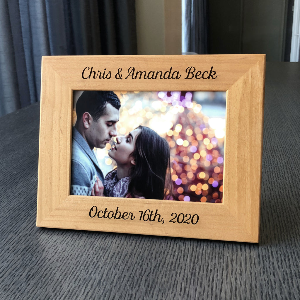 A custom picture frame with names and a wedding date